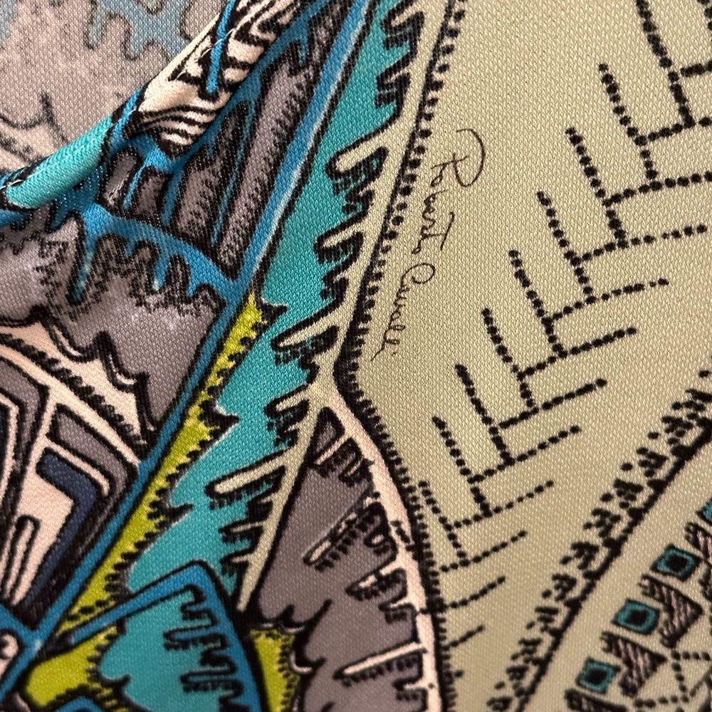 Roberto Cavalli top. Long sleeve. Deep V. Size EU 40. Light blue/black